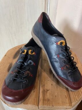 Rieker Woman’s Casual Leather Lace-Up Sneakers in Navy with Burgundy Accents